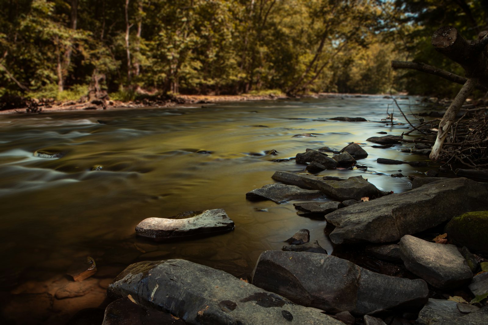 the Cuyahoga river rushes through the valley in a long exposure