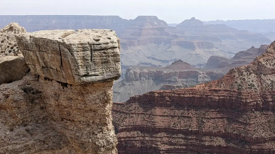 A rock ledge jutting out over the canyon