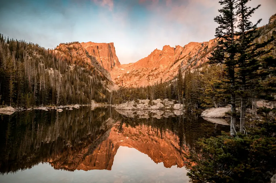 Hallett Peak glowing at sunset above Dream Lake