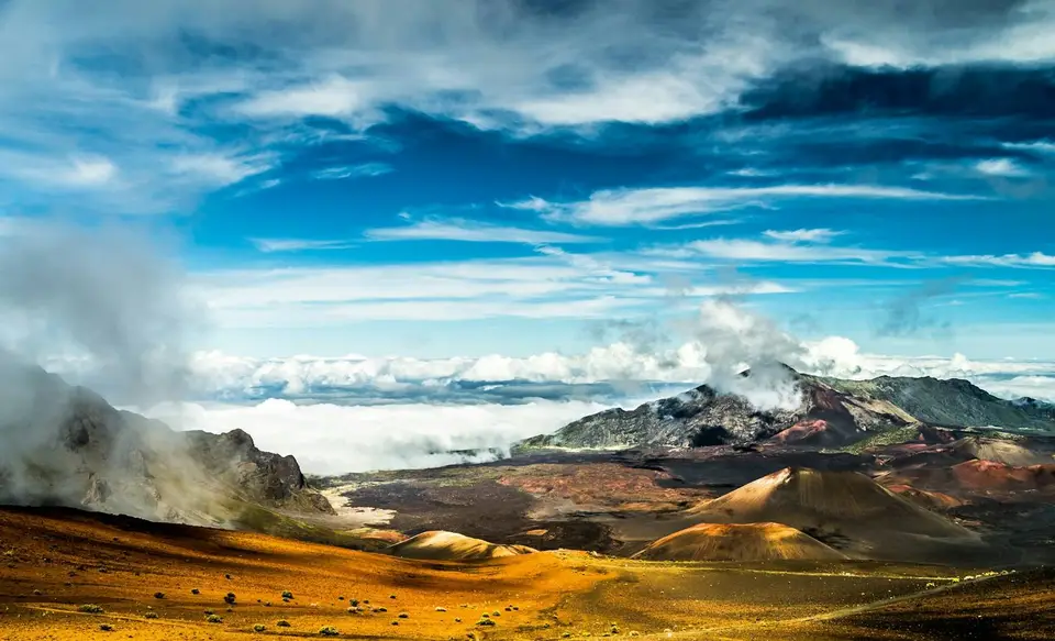 Clouds getting in Haleakala Crater, 10,023 ft above sea level, Haleakala National Park. An incredible combination of natural colors