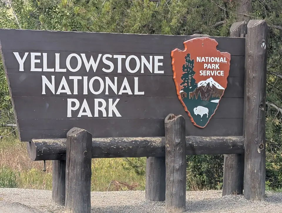 Wooden Yellowstone National Park entrance sign